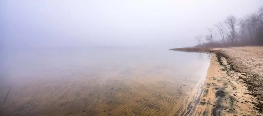 20524312 foggy empty lonely beach ottawa river