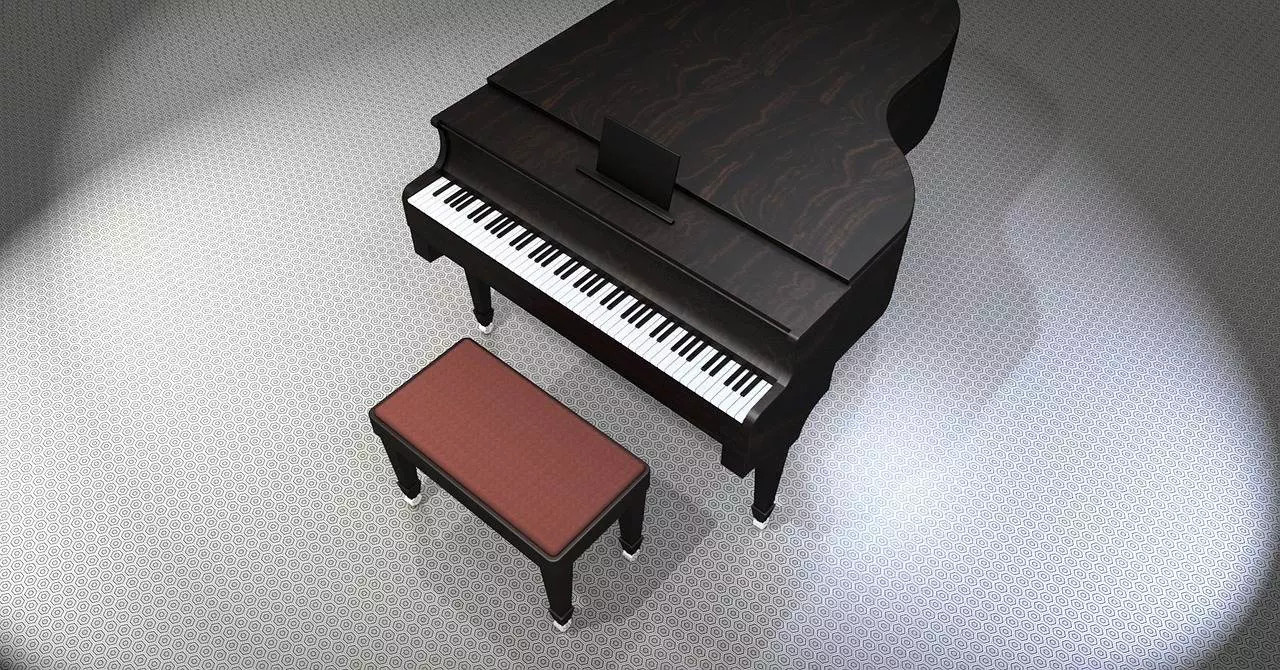 A piano and a seat in an isolated white room.
