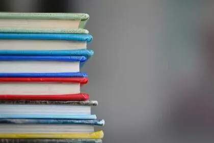 a stack of books on the side of the frame.