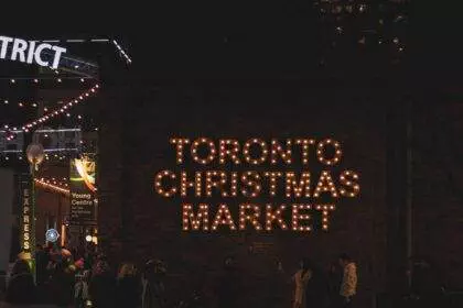 Toronto Christmas Market is written with sparkling lights.