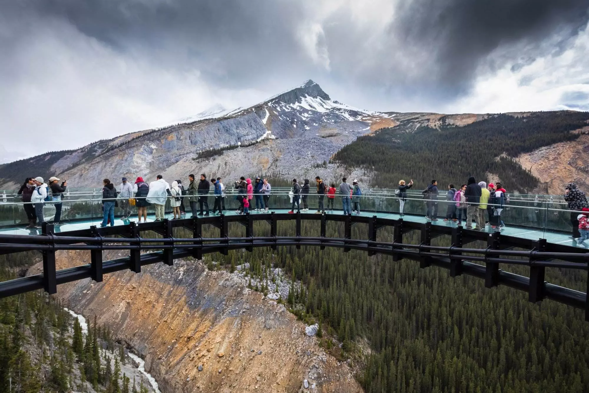 People on a bridge in Banff National Park