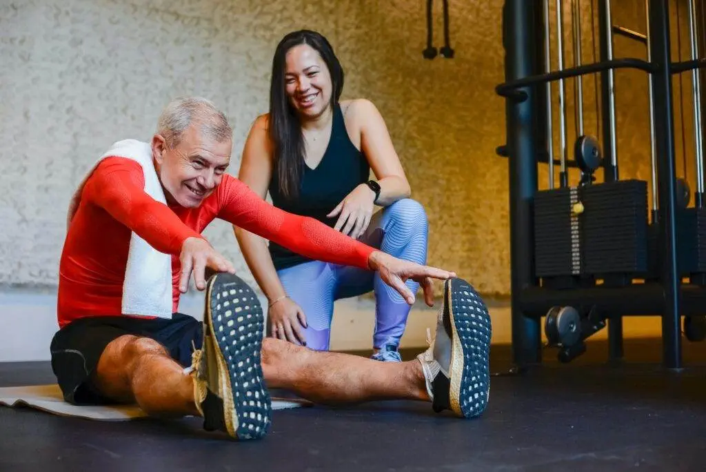 Your Options When Starting an Online Training Biz A woman training an old man