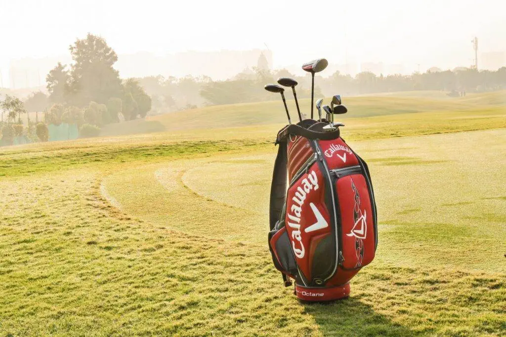 How to Fit Yourself for Golf Clubs A golf gear bag was kept isolated on the gold field.