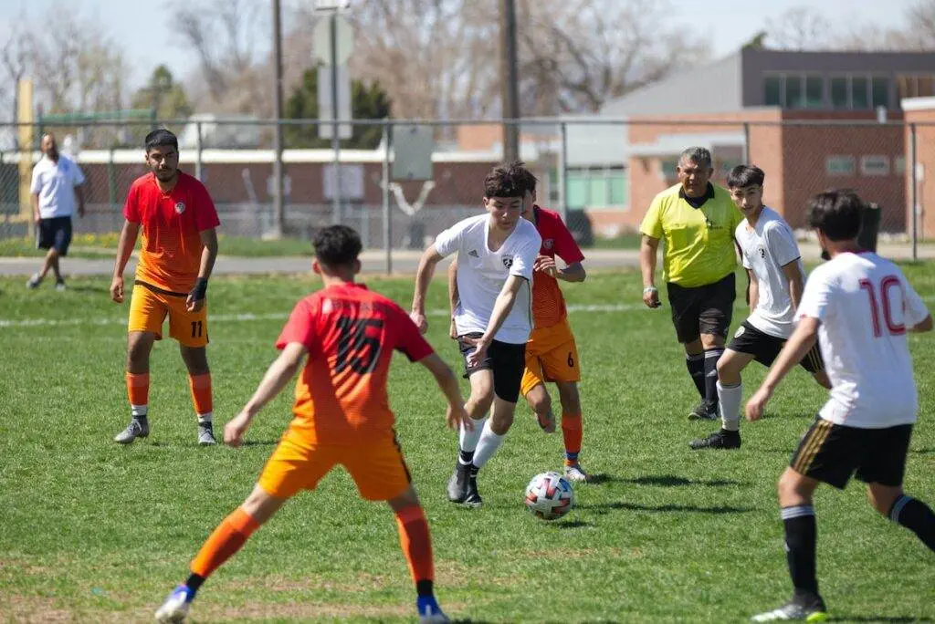 How Long Is a Soccer Game? Group of men playing soccer