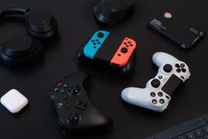 An aesthetic view of gaming, with controllers and headphones.