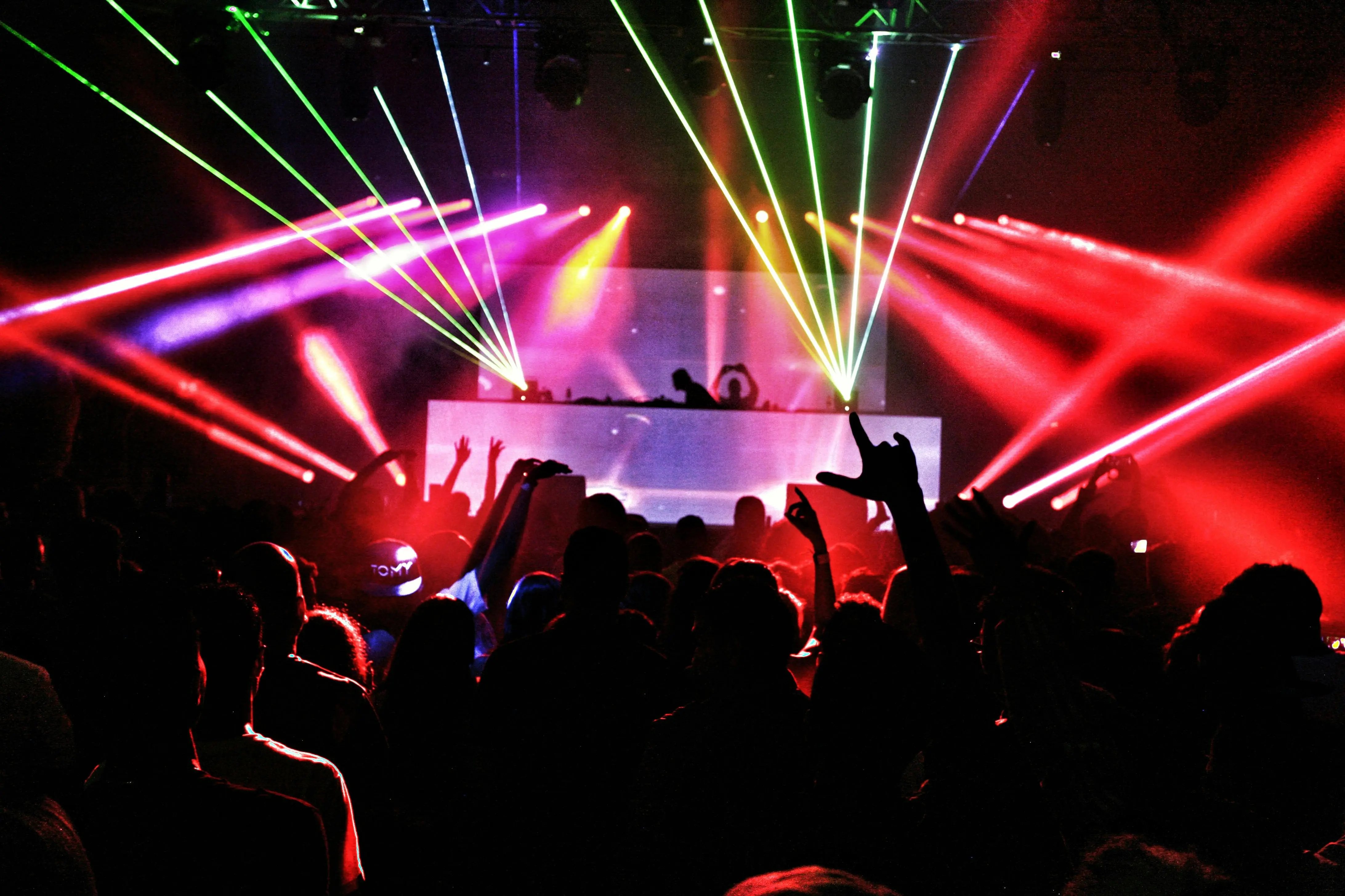 A view from Vancouver nightclubs. EDM lights glow all over the disco platform.