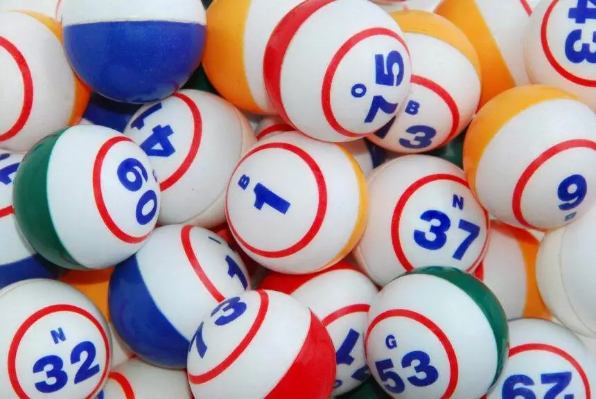 A filled background of many bingo balls from all colors.